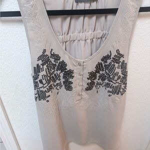Theme Beige Sleeveless Blouse with Black Embellishments